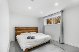 Ένα ή περισσότερα κρεβάτια σε δωμάτιο στο Chalet Oasis du Bois