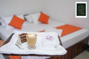 Postel nebo postele na pokoji v ubytování Coffee Shade