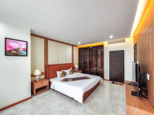 Postel nebo postele na pokoji v ubytování T.26 Hotel