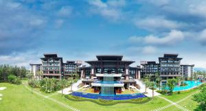 an aerial view of a resort with a swimming pool at Arcadia Resort Hainan in Lingshui