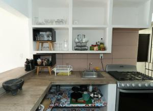 Kjøkken eller kjøkkenkrok på Casa Jaguar