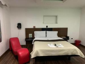 Postel nebo postele na pokoji v ubytování Hotel Planeta 3