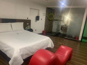 Postel nebo postele na pokoji v ubytování Hotel Planeta 3