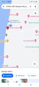 uma imagem de um telemóvel com um mapa em Chez Bethy Jungle et Océan em Abémé