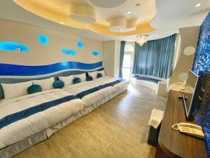 TV a/nebo společenská místnost v ubytování Dream Ocean View B&B