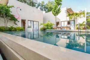 Bazén v ubytování Faisano Boutique Hotel by Cruz Hoteles nebo v jeho okolí