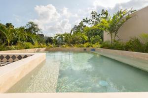 Bazén v ubytování Faisano Boutique Hotel by Cruz Hoteles nebo v jeho okolí