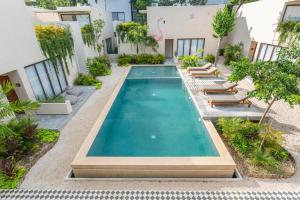 Bazén v ubytování Faisano Boutique Hotel by Cruz Hoteles nebo v jeho okolí