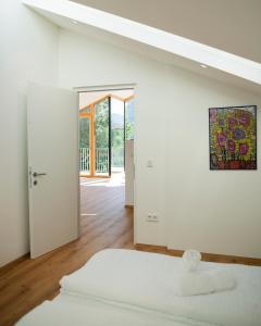 En eller flere senge i et værelse på Villa Camilde - elegance and relax in Merano