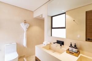 Koupelna v ubytování Faisano Boutique Hotel by Cruz Hoteles
