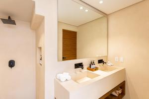 Koupelna v ubytování Faisano Boutique Hotel by Cruz Hoteles