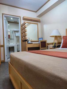 Η κουζίνα ή μικρή κουζίνα στο PHELA GRANDE HOTEL