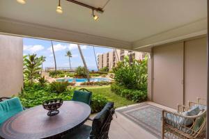 Um jardim no exterior de Hale Ono Loa 114- Ground floor partial ocean view gem