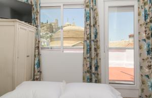 Postel nebo postele na pokoji v ubytování Monteftur