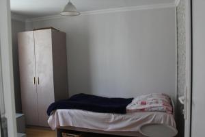 Postel nebo postele na pokoji v ubytování Nunuka House