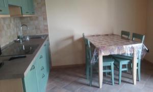 Kuchyň nebo kuchyňský kout v ubytování Casa Vacanze Chez Sapin + 21 fotografií