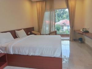 Voodi või voodid majutusasutuse CLIFFVIEW RESORT toas