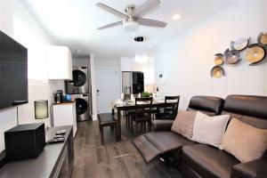 a living room with a couch and a dining room at Secluded & Quiet Guest House-Cherry Valley-Morongo in Cherry Valley