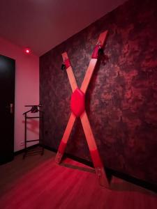 a room with a wall with a x on it at Love Room 208 Appartement 30m2 in Lambersart