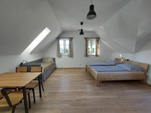 Postel nebo postele na pokoji v ubytování Apartmány Ema a Ela