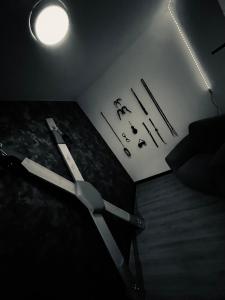 a room with a bed with writing on the wall at Love Room 208 Appartement 30m2 in Lambersart +6 photos