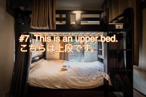 Postel nebo postele na pokoji v ubytování Wabi Sabi Hostel