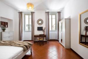 Televízia a/alebo spoločenská miestnosť v ubytovaní Trevi Fountain House Deluxe