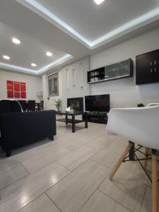 TV a/nebo společenská místnost v ubytování Mayla house