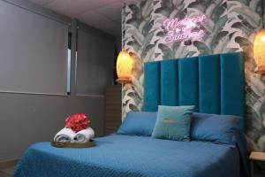 Postel nebo postele na pokoji v ubytování SUITES FullHouse