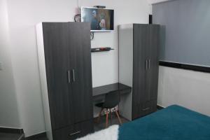 TV a/nebo společenská místnost v ubytování SUITES FullHouse