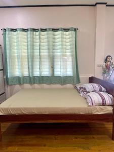 Легло или легла в стая в Maria Kulafu Kubo House Kinamaligan beside Eglin Gas Station