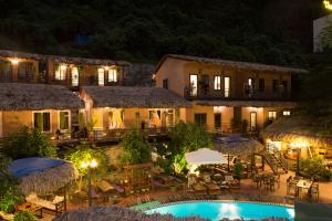 an aerial view of a resort at night at Catba Oasis Bungalows in Cat Ba