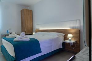 Postel nebo postele na pokoji v ubytování B&B Alba