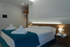 Postel nebo postele na pokoji v ubytování B&B Alba