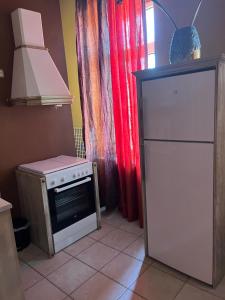 Kuchyň nebo kuchyňský kout v ubytování AMFITRION CITY + 24 fotografií