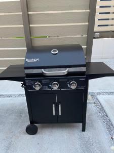 a black grill sitting on top of a table at Pleasure Point Ichinomiya in Ichinomiya +58 photos