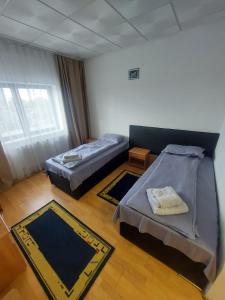 Postel nebo postele na pokoji v ubytování Magnific Hotel