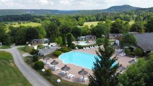 an aerial view of a resort with a swimming pool at Domaine de l'Epinette in Châtillon