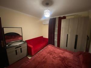 A bed or beds in a room at Comfortable studio in madinaty compound B11