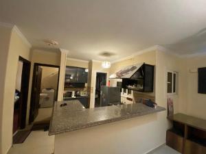A television and/or entertainment centre at Comfortable studio in madinaty compound B11