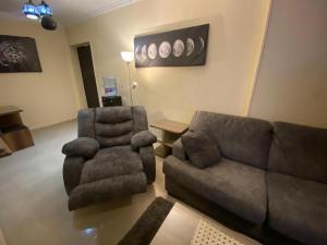 A seating area at Comfortable studio in madinaty compound B11