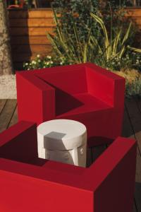 a red box with a toilet inside of it at Re Versiliana Hotel in Marina di Pietrasanta