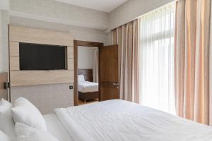 Hotel 25 Bakuriani客房内的一张或多张床位