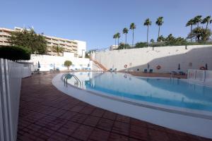 Bazén v ubytování Confortevole appartamento playa del ingles nebo v jeho okolí