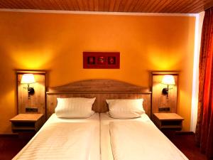 Postel nebo postele na pokoji v ubytování Hotel Paintner