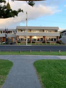 a building on the side of a road at The Oceanside Motel in Whitianga
