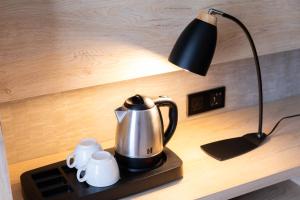 Hotel 25 Bakuriani的咖啡和沏茶工具