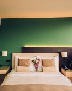 Postel nebo postele na pokoji v ubytování Crowne Plaza Geneva by IHG