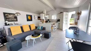 Kuchyňa alebo kuchynka v ubytovaní Charmante maison avec annexe - jardin - parking - proche plages