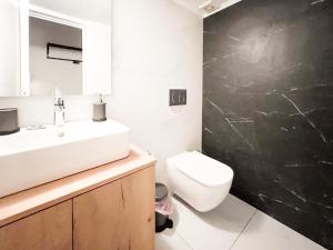 Kúpeľňa v ubytovaní Harmonia ANhome Premium Selections